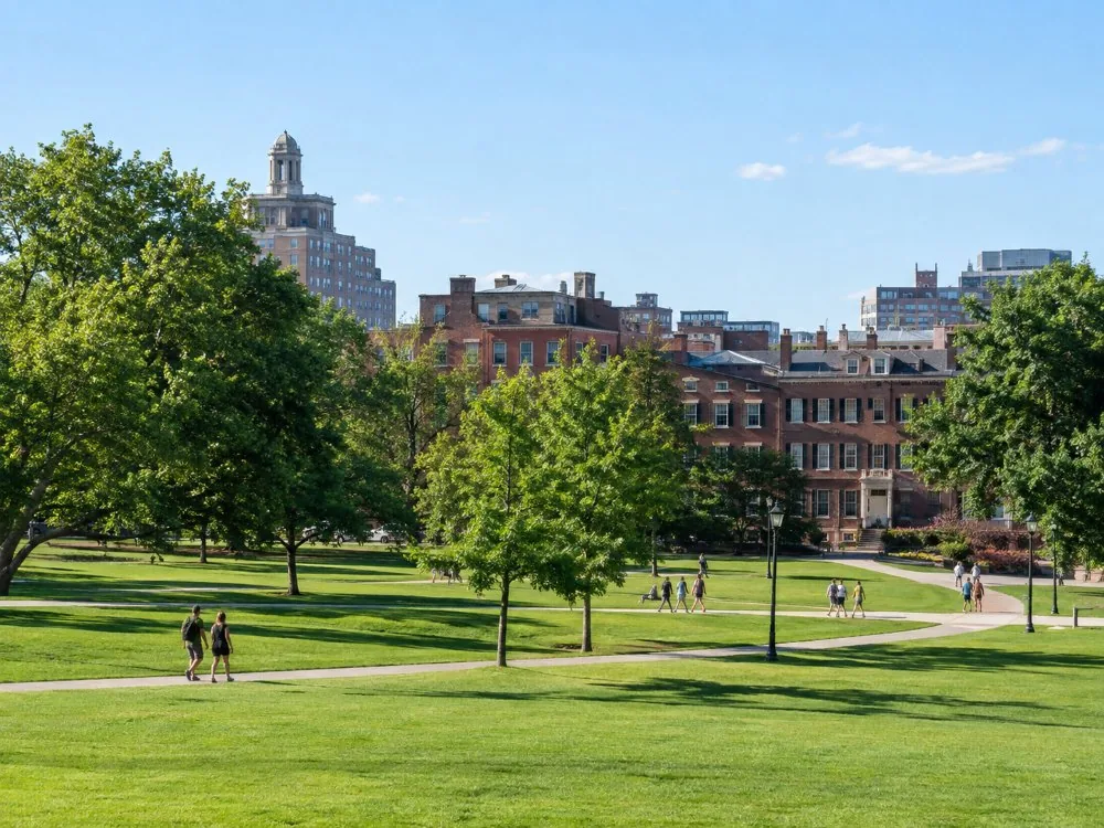 Visitors crossing Independence Mall’s lawns on a sunny afternoon